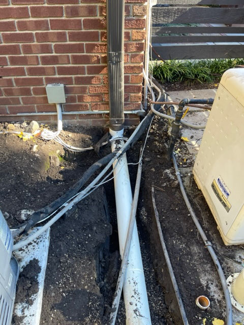 Brick Paver Patio downspout extensions in franklin michigan