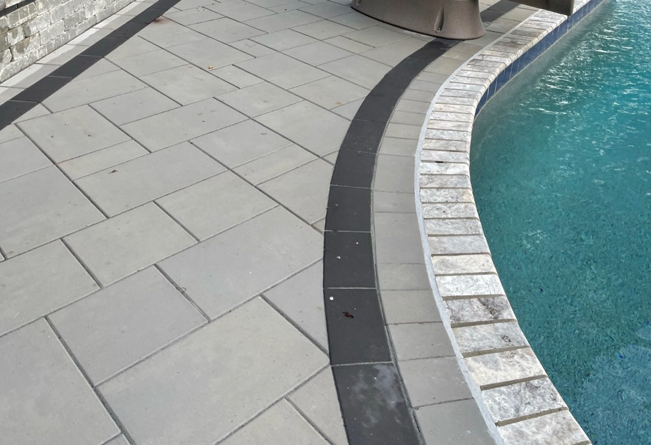 Paver Patio, Stone Steps and Stone Retaining Wall swimming pool paver deck installation michigan
