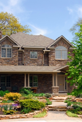 stone retaining wall and landscaping